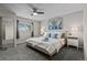 Relaxing main bedroom with soft lighting, comfortable linens, and mirrored closet doors at 20908 E Dorado Cir, Centennial, CO 80015