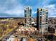 Stunning aerial view of two high-rise towers with pools and lush landscaping at 1674 Fillmore St # Al3, Denver, CO 80206