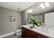 Bathroom features a double vanity, hardwood floors, and modern fixtures at 1674 Fillmore St # Al3, Denver, CO 80206