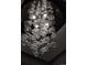 Unique bubble chandelier suspended from the ceiling creating an artful lighting display at 1674 Fillmore St # Al3, Denver, CO 80206
