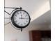 Attractive vintage double sided decorative clock adding character to the room at 1674 Fillmore St # Al3, Denver, CO 80206