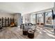 Bright living room featuring stylish furniture, hardwood floors, and an abundance of natural light at 1674 Fillmore St # Al3, Denver, CO 80206