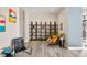 Inviting sitting area with modern furniture, artistic decor and beautiful hardwood floors at 1674 Fillmore St # Al3, Denver, CO 80206