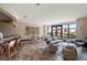 Bright lounge with comfortable seating, a bar area, and large windows offering a pleasant view at 1674 Fillmore St # Al3, Denver, CO 80206