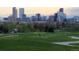 Breathtaking skyline view with a golf course in the foreground, offering leisure and scenic beauty at 1674 Fillmore St # Al3, Denver, CO 80206