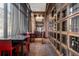 Wine room with individual storage lockers, tables, and chairs for tastings at 1674 Fillmore St # Al3, Denver, CO 80206
