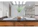 Elegant bathroom with dual sinks, granite countertops, and a glass-enclosed shower, creating a luxurious spa-like experience at 40 Madison St # 103, Denver, CO 80206