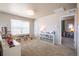Spacious bonus room with carpet flooring, a large window, and ample storage at 476 Hyde Park Cir, Castle Pines, CO 80108