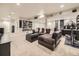 Finished basement with entertainment area, home office and built-in bookshelves at 7782 S Louthan St, Littleton, CO 80120