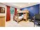 Bedroom featuring a custom-built wooden bunkbed with built-in storage at 7782 S Louthan St, Littleton, CO 80120