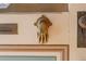 Charming front door featuring an ornate brass hand door knocker and traditional hardware at 2245 Julian St, Denver, CO 80211