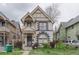 Charming two-story home with unique architectural details and a welcoming front porch at 2245 Julian St, Denver, CO 80211