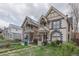 Street view of a vintage home featuring distinctive architectural design and well-kept landscaping at 2245 Julian St, Denver, CO 80211