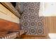 Close-up of a patterned tile floor with intricate geometric designs at 2245 Julian St, Denver, CO 80211