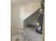 Bright utility room featuring concrete floor and a modern water heater system at 3530 Chase St. St, Wheat Ridge, CO 80212
