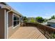 Wooden back deck overlooking the community, perfect for outdoor dining and relaxation at 2430 E 109Th Dr, Northglenn, CO 80233