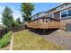 Elevated deck with fenced yard, offering a serene outdoor space for relaxation and gatherings at 2430 E 109Th Dr, Northglenn, CO 80233