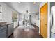 Cozy dining room with modern fixtures, a white table set, and an abundance of light at 2430 E 109Th Dr, Northglenn, CO 80233