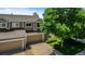 Elevated view showcasing the home's architectural details, two-car garage, and well-manicured lawn at 2430 E 109Th Dr, Northglenn, CO 80233