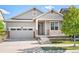 Attractive single-Gathering home featuring a two-car garage and a welcoming entrance at 14850 Munich Ave, Parker, CO 80134