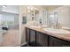 Bathroom featuring double sinks, modern fixtures, and a clean, bright space for convenience at 19760 W 59Th Dr, Golden, CO 80403