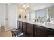 Well lit bathroom with double sink vanity, and updated fixtures at 19760 W 59Th Dr, Golden, CO 80403
