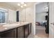 Bathroom featuring double sinks, modern fixtures, and a clean, bright space for convenience at 19760 W 59Th Dr, Golden, CO 80403