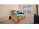Comfortable bedroom with ample storage space and natural light, creating a cozy retreat at 19760 W 59Th Dr, Golden, CO 80403
