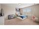 Cozy bedroom with a large window that brings in lots of natural light at 19760 W 59Th Dr, Golden, CO 80403