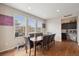 Cozy dining room filled with natural light, hardwood floors, and modern décor at 19760 W 59Th Dr, Golden, CO 80403