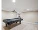 Finished basement recreation room offering a pool table and neutral wall colors at 19760 W 59Th Dr, Golden, CO 80403