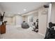 Finished basement featuring a fitness area and a comfortable beanbag seating area at 19760 W 59Th Dr, Golden, CO 80403