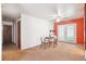 Cozy dining area with carpeted floors, ceiling fan, and a set table for four at 12046 W Green Mountain Dr, Lakewood, CO 80228
