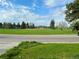 Scenic view of the expansive green space of the nearby park under a blue sky at 12046 W Green Mountain Dr, Lakewood, CO 80228