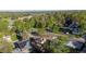 Birds-eye view of the property highlighting the landscaped yard and a large trees at 10909 W 65Th Way, Arvada, CO 80004
