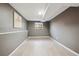Bedroom with light wood flooring, base-molding, and a bright window at 10909 W 65Th Way, Arvada, CO 80004