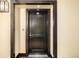 Contemporary entryway showcases a dark wood door with modern hardware and an apartment number at 1560 Blake St # 810, Denver, CO 80202