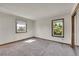 Bright and spacious bedroom with two windows, providing ample natural light at 2882 Gentry Ct, Watkins, CO 80137