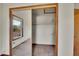 Spacious closet featuring sliding mirror doors and ample shelving for optimal storage solutions at 2882 Gentry Ct, Watkins, CO 80137
