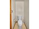 Close-up view of a standard toilet in a small, simple bathroom at 2882 Gentry Ct, Watkins, CO 80137