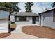 Backyard showcasing a mulched play area, and a storage shed at 916 Florence St, Aurora, CO 80010