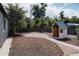 Backyard view with mulch and a play house at 916 Florence St, Aurora, CO 80010