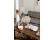 Inviting living room with a comfy sofa, a wooden coffee table, and stylish accents at 916 Florence St, Aurora, CO 80010