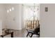 Bright and airy living room view into dining area, filled with natural light and modern decor at 916 Florence St, Aurora, CO 80010