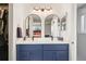 Modern bathroom with double sink vanity, stylish mirrors, and neutral wall color at 3881 S Bahama St, Aurora, CO 80013