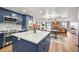 Bright and airy kitchen showcasing an open design concept and hardwood floors at 3881 S Bahama St, Aurora, CO 80013