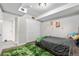 Bedroom featuring a bed and music-themed décor at 6375 S Jackson St, Centennial, CO 80121
