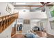 Open-concept living area with vaulted ceilings, hardwood floors, and lots of light at 6375 S Jackson St, Centennial, CO 80121
