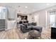 Inviting living room features an open concept to kitchen, creating a great flow for entertaining at 1245 Utica St # 104, Denver, CO 80204