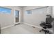 Bright office space with carpet flooring, natural light, and a sliding door to a patio at 1245 Utica St # 104, Denver, CO 80204